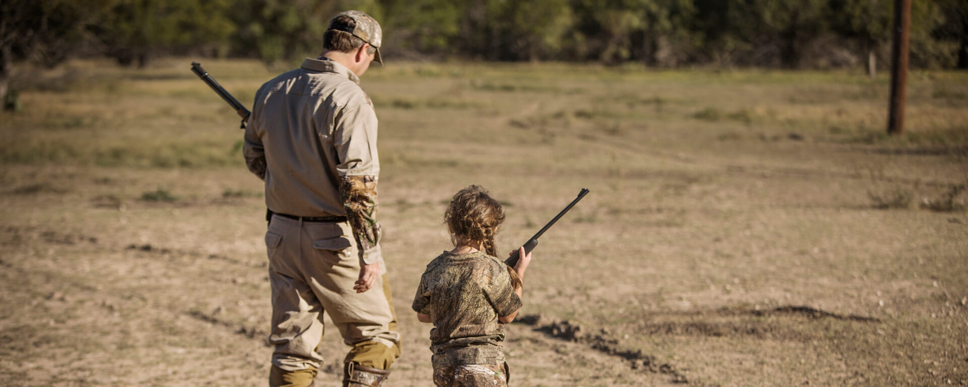 Hunting Father and Daughter using Evans Outdoors products